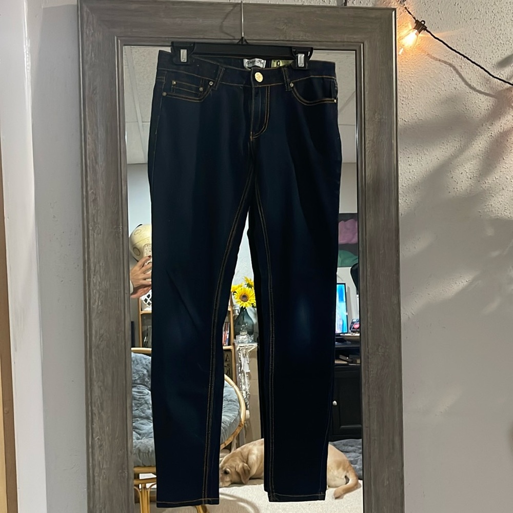 Size 9 skinny jean by indigo rain, cotton poly spandex. Regular length.